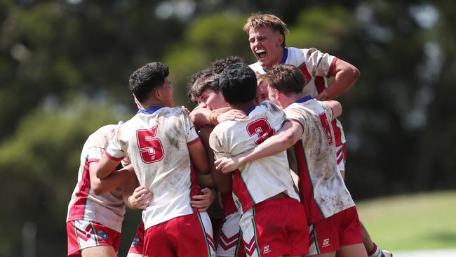 Monaro players celebrate their victory. Picture: Sue Graham