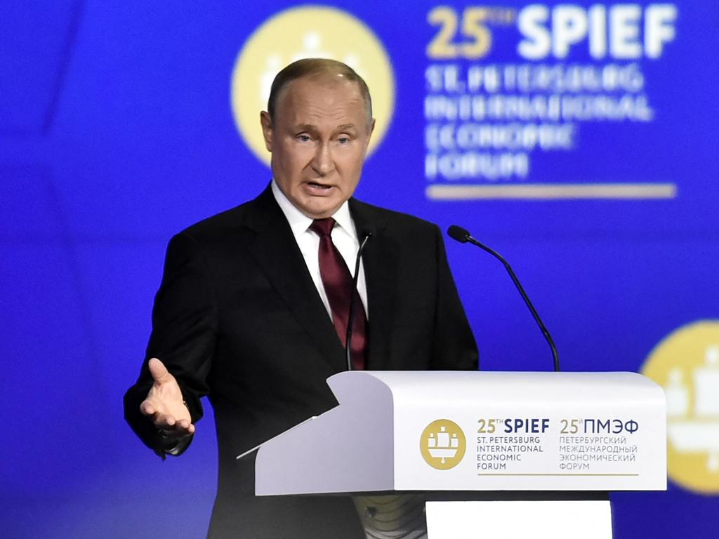 Russian President Vladimir Putin gives a speech at a plenary session of the Saint Petersburg International Economic Forum (SPIEF) in Saint Petersburg on June 17, 2022. (Photo by Olga MALTSEVA / AFP)