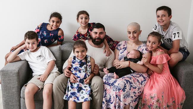 Metin Salih and Alisha Harrison with their seven children. Picture: Carmela Roche