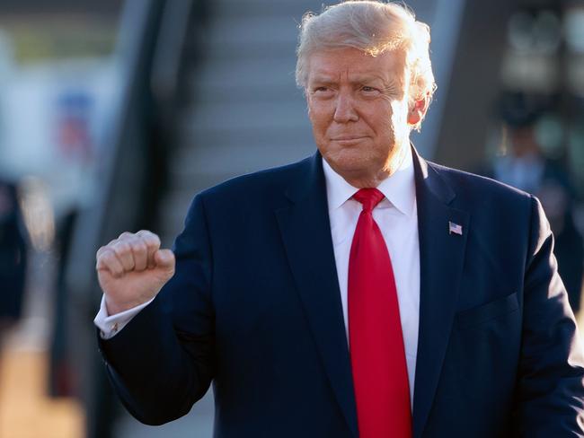 US President Donald Trump arrives to address supporters during a campaign rally at Manchester - Boston Regional Airport in Londonderry, New Hampshire, August 28, 2020. (Photo by SAUL LOEB / AFP)