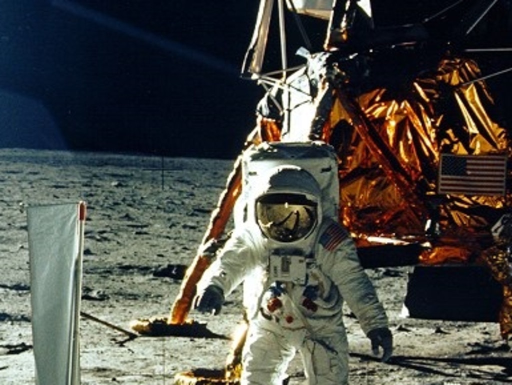 This July 20, 1969, photo obtained from NASA and taken by Neil Armstrong, shows astronaut Buzz Aldrin on the Moon's Sea of Tranquility. - When the Saturn V rocket built by Wernher von Braun launched with the Apollo 11 capsule at its summit on July 16 1969, one million people flocked to watch the spectacle on the beaches of Florida near Cape Canaveral. But many had doubts that they'd succeed in landing this time. (Photo by Neil ARMSTRONG / NASA / AFP) / **RESTRICTED TO EDITORIAL USE - MANDATORY CREDIT "AFP PHOTO / NASA" - NO MARKETING - NO ADVERTISING CAMPAIGNS - DISTRIBUTED AS A SERVICE TO CLIENTS **TO GO WITH AFP STORY by Ivan Couronne, "To the Moon and back: mankind's giant leap 50 years on"