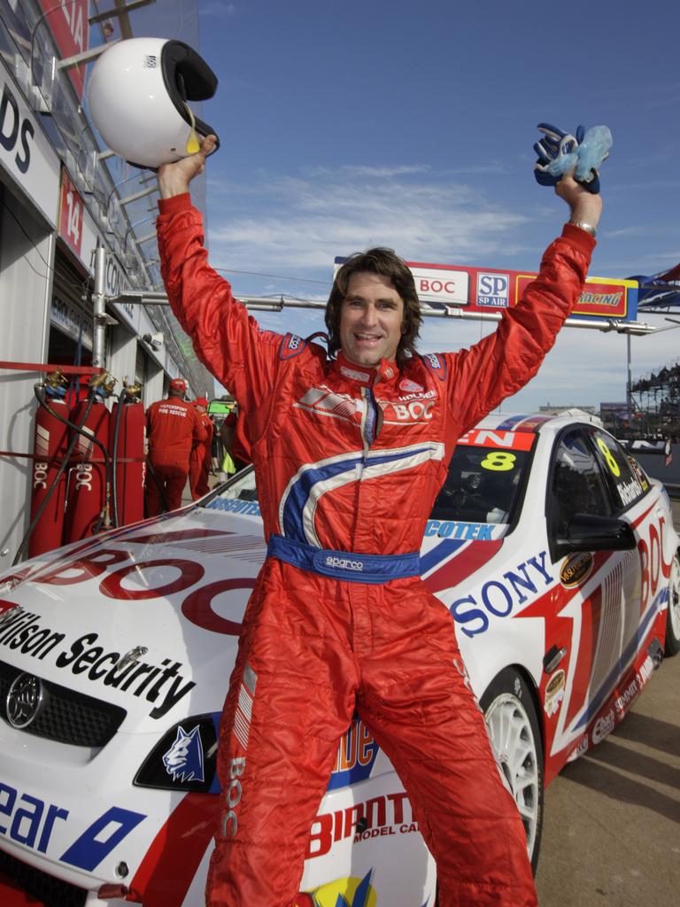 Pete Murray celebrates after being taken for a hot lap with Jason Richards of Brad Jones Racing.