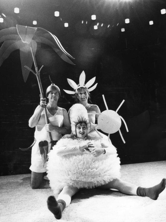 Peter Crossley, Jane Menelaus and Doris Younane (front) show off their Gum Nut Baby, Flannel Flower and Wattle Ball costumes at rehearsals for 'Away'.