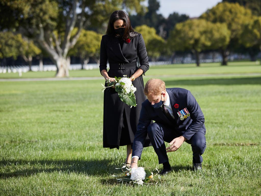 Harry and Meghan lay a wreath at Los Angeles National Cemetery on Remembrance Day.