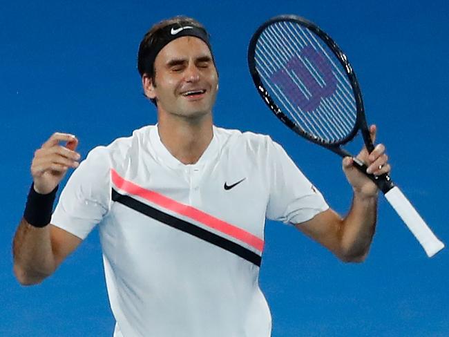 MELBOURNE, AUSTRALIA - JANUARY 28:  Roger Federer of Switzerland celebrates winning championship point in his men's singles final match against Marin Cilic of Croatia on day 14 of the 2018 Australian Open at Melbourne Park on January 28, 2018 in Melbourne, Australia.  (Photo by Scott Barbour/Getty Images)