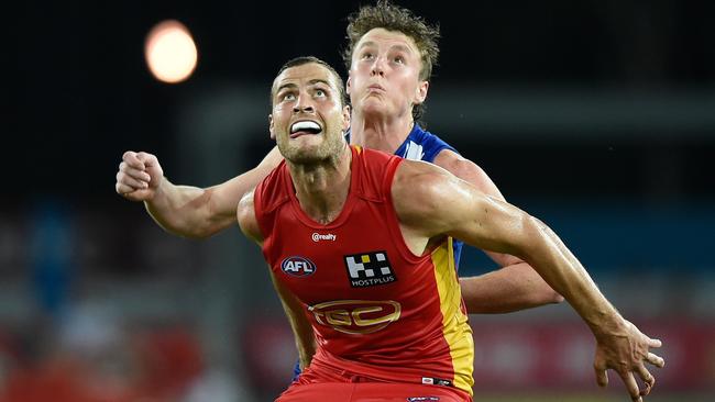 Jarrod Witts competes for the ball against Nick Larkey. Picture: Getty Images