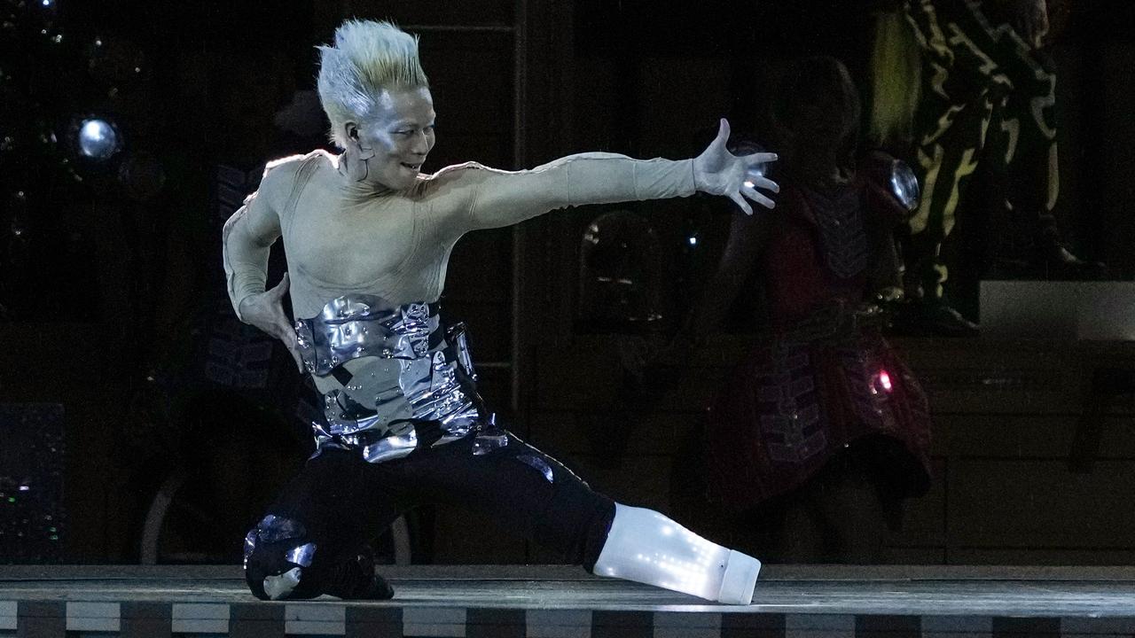 A performer takes part in the opening ceremony for the Tokyo 2020 Paralympic Games.)