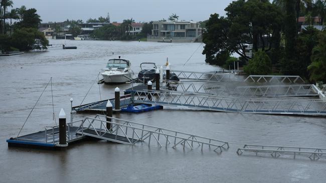 Canal homes at Bundall inundated by flood waters. Picture: Navarone Farrell