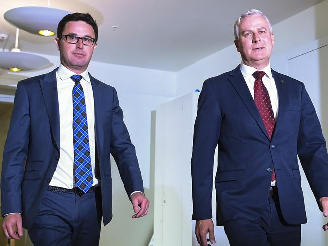 Re-elected Nationals Party leader Michael McCormack (right) and newly-elected Deputy leader David Littleproud arrive for a press conference after Nationals party leadership spill at Parliament House in Canberra, Tuesday, February 4, 2020. (AAP Image/Lukas Coch) NO ARCHIVING