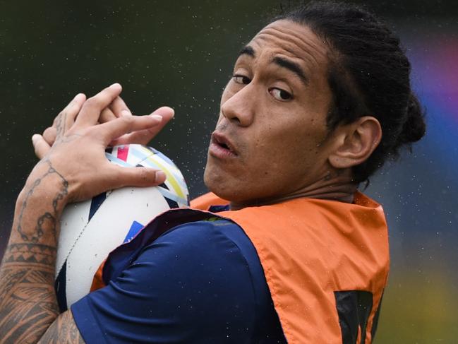 Australia's wing Joe Tomane takes part in an Australia team training session on September 21, 2015 at the University of Bath, south west England, ahead of their opening Rugby World Cup 2015 match against Fiji on Wednesday. AFP PHOTO / MARTIN BUREAU RESTRICTED TO EDITORIAL USE