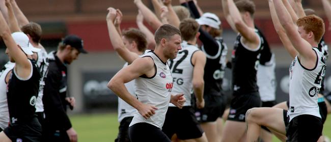 Port Adelaide’s Brad Ebert trains with teammates at Alberton Oval on Thursday. Picture: AAP Image/Kelly Barnes