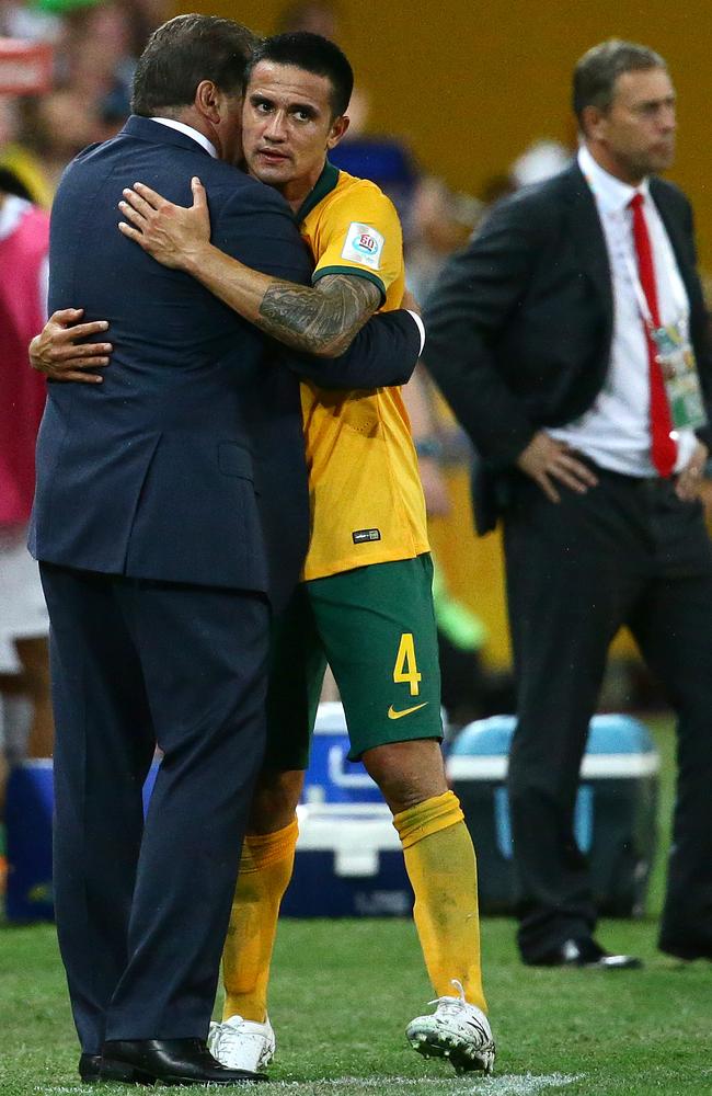 Ange Postecoglou congratulates Tim Cahill on his match-winning effort.