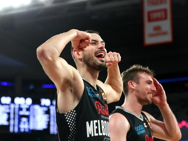 MELBOURNE, AUSTRALIA - APRIL 24: Chris Goulding of United and Mitch McCarron of Melbourne United celebrate after the win during the round 15 NBL match between Melbourne United and the Adelaide 36ers at John Cain Arena, on April 24, 2021, in Melbourne, Australia. (Photo by Kelly Defina/Getty Images)