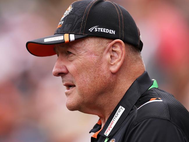 SYDNEY, AUSTRALIA - MARCH 12: Tigers coach Tim Sheens watches players warm up during the round two NRL match between Wests Tigers and Newcastle Knights at Leichhardt Oval on March 12, 2023 in Sydney, Australia. (Photo by Cameron Spencer/Getty Images)