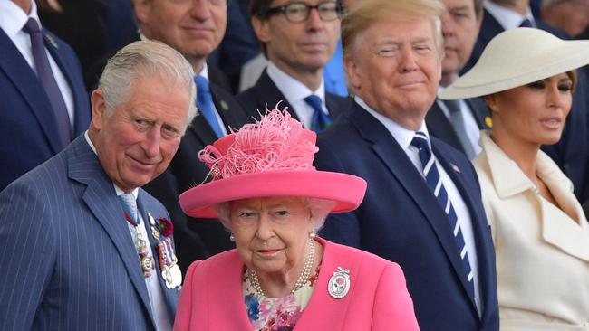 (FILE PIC) Britain's Queen Elizabeth II (2L) leaves as (L-R) Britain's Prince Charles, Prince of Wales, Britain's Queen Elizabeth II, US President Donald Trump, US First Lady Melania Trump and Greek President Prokopis Pavlopoulos stand at the end of an event to commemorate the 75th anniversary of the D-Day landings, in Portsmouth, southern England, on June 5, 2019. - US President Donald Trump, Queen Elizabeth II and 300 veterans are to gather on the south coast of England on Wednesday for a poignant ceremony marking the 75th anniversary of D-Day. Other world leaders will join them in Portsmouth for Britain's national event to commemorate the Allied invasion of the Normandy beaches in France -- one of the turning points of World War II. (Photo by Daniel LEAL-OLIVAS / AFP)