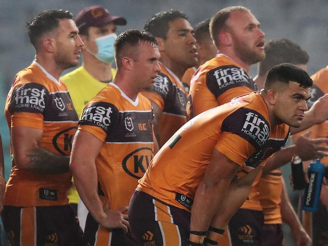 Dejected Brisbane players after a try by Souths Adam Reynolds during the Souths v Broncos NRL match at ANZ Stadium, Homebush. Picture: Brett Costello