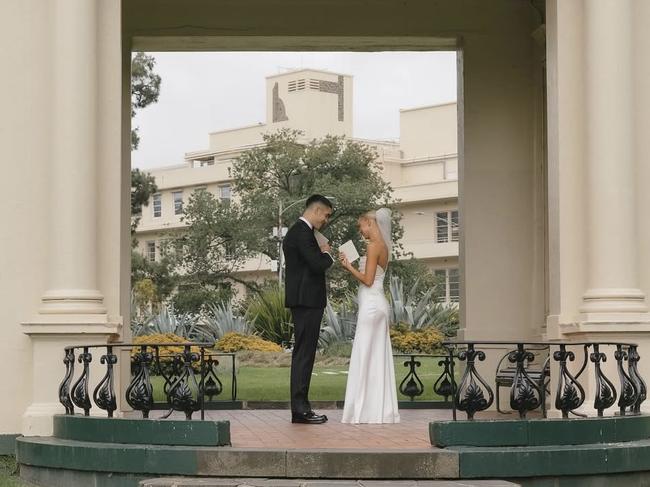 The pair exchanges vows at Fitzroy Gardens. Picture: Bianca Virtue Weddings