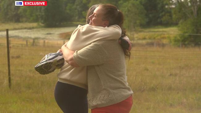 Kathleen Folbigg hugs Tracy Chapman, her childhood friend and longtime advocate, at Ms Chapman’s Glenreagh property. Picture: 9 News