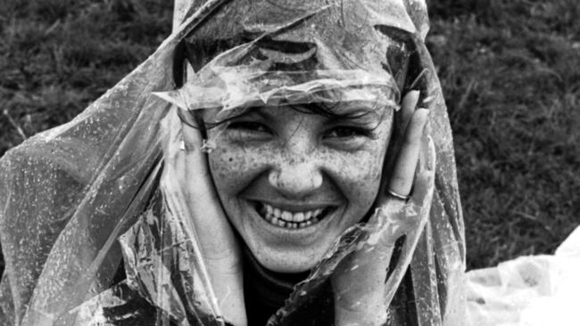 Battling the rain at the 1975 Sunbury Pop Festival.