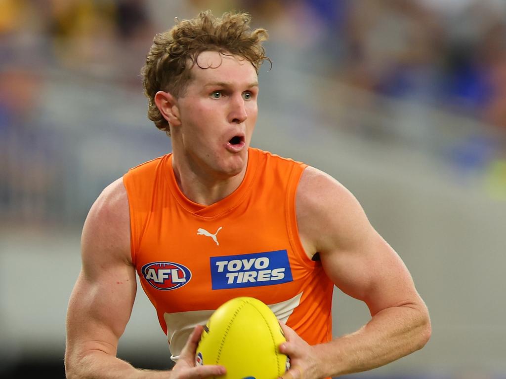 PERTH, AUSTRALIA - MARCH 24: Tom Green of the Giants looks for options as he runsdown the field during the round two AFL match between West Coast Eagles and Greater Western Sydney Giants at Optus Stadium, on March 24, 2024, in Perth, Australia. (Photo by James Worsfold/AFL Photos/via Getty Images )