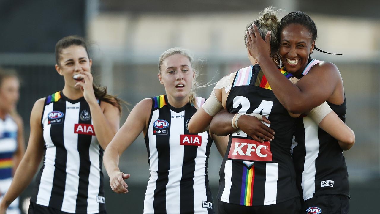 Pies star Sophie Alexander celebrates a goal with Sabrina Frederick.