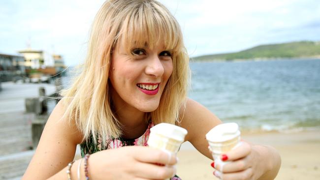 Journalist Swain at Manly with melting ice cream cones. It’s probably a metaphor or something. Who knows in this topsy-turvy world now. Or, she maybe just does not eat ice cream very quickly. Picture: Annika Enderborg