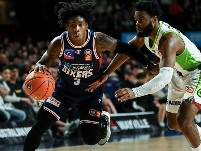 ADELAIDE, AUSTRALIA - OCTOBER 03: Kendric Davis of the 36ers  competes with Derrick Walon Jr of the Phoenix  during the round three NBL match between Adelaide 36ers and South East Melbourne Phoenix at Adelaide Entertainment Centre, on October 03, 2024, in Adelaide, Australia. (Photo by Mark Brake/Getty Images)