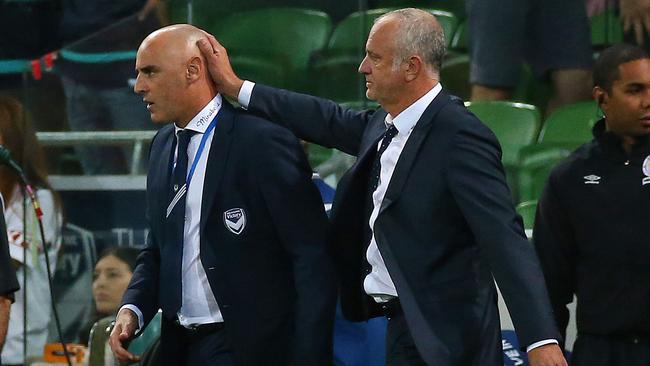 Melbourne Victory v Sydney FC at AAMI Park, 27 February, Melbourne Australia. Melbourne Victory coach Kevin Muscat and Sydney FC's coach Graham Arnold after the match. Picture : George Salpigtidis