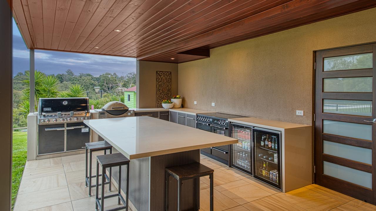 An outdoor entertaining haven with built-in wine fridges and barbecues.