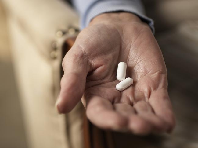 Senior woman holding two pills, close-up of hand, Closeup of a senior man being given a life saving pill, Patient, Senior Adult, Medicine, Taking Medicine, Adult, Adults Only, Background, Bed, Blur, Care, Citizen, Close-Up, Colour Image, Drinking Water, Focus, Grandfather, Healthcare And Medicine, Holding, Horizontal, Human Age, Human Hand, Illness, Lifestyles, Males, Mature Adult, Men, People, Photography, Pill, Portrait, Prescription Medicine, Retirement, Room, Saving, Serene People, Sleeping, Sleeping Pill, Smiling, The Ageing Process, Treatment, Water, thinkstock, istock, generic