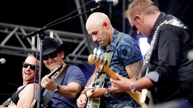 Lee Kernaghan plays a song with the Wolfe Brothers. Picture: MARK CALLEJA