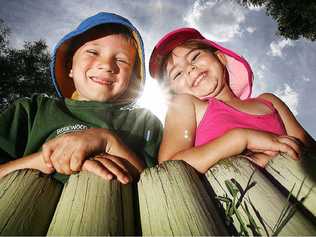 Ben and Isabella from the C & K Kindergarten in Rosewood are happy the centre will now be harnessing the power of the sun with new solar panels. . Picture: Rob Williams