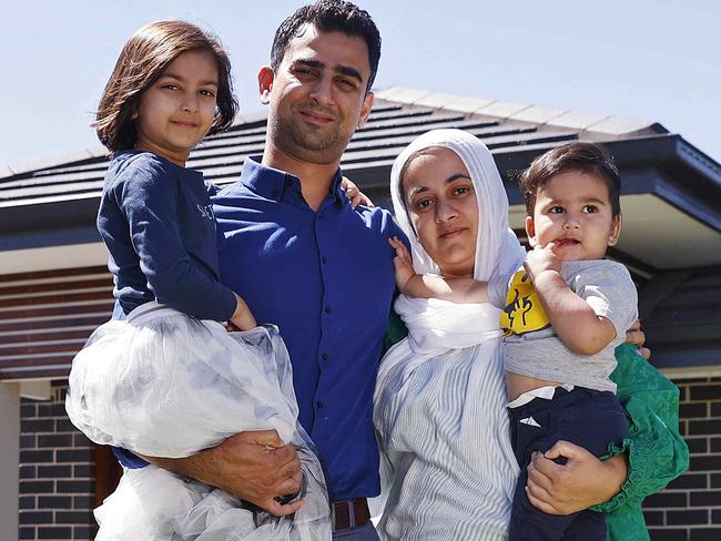 WEEKEND TELEGRAPHS - 4/2/23  MUST CHECK WITH PIC EDITOR JEFF DARMANIN BEFORE PUBLISHING  -Local families in Riverstone appalled at the lack of infrastructure in their new community after buying homes in the area. Bilal Mustafa with his wife Wajiha and kids Aaima (5yr old girl) and Awhile (16mth old boy) at their home today. Picture: Sam Ruttyn