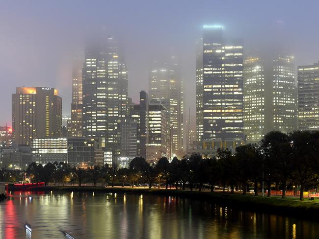 Fog lays over the city buildings, Melbourne. Picture: Nicole Garmston