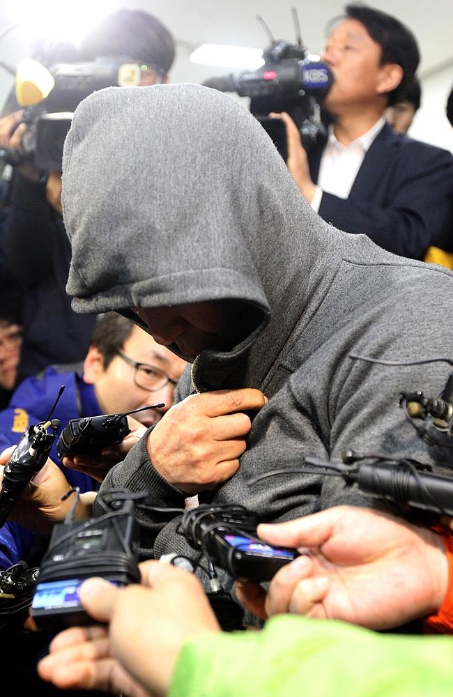 Under investigation ... Lee Joon-Seok, captain of the South Korean ferry that capsized at sea off the coast of Jindo, is interviewed at Mokpo police station in Mokpo. Picture: Yonhap