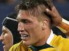 CHICAGO, IL - SEPTEMBER 05: Sean McMahon #7 of the Australia Wallabies (center) is congratulated by teammates after scoring a try against the United States Eagles during a match at Soldier Field on September 5, 2015 in Chicago, Illinois. Australia defeated the United States 47-10. Jonathan Daniel/Getty Images/AFP == FOR NEWSPAPERS, INTERNET, TELCOS & TELEVISION USE ONLY ==