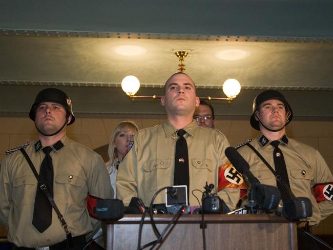 NSM leader Jeff Schoep, centre, is a Trump supporter. Picture: Alamy