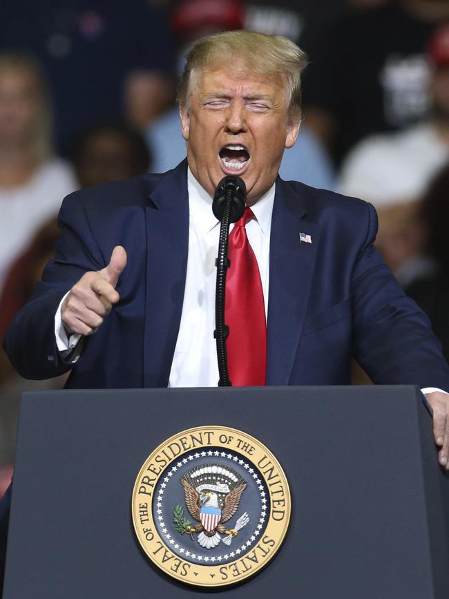 President Donald Trump speaks at his campaign rally on Saturday. Picture: Matt Barnard/Tulsa World via AP