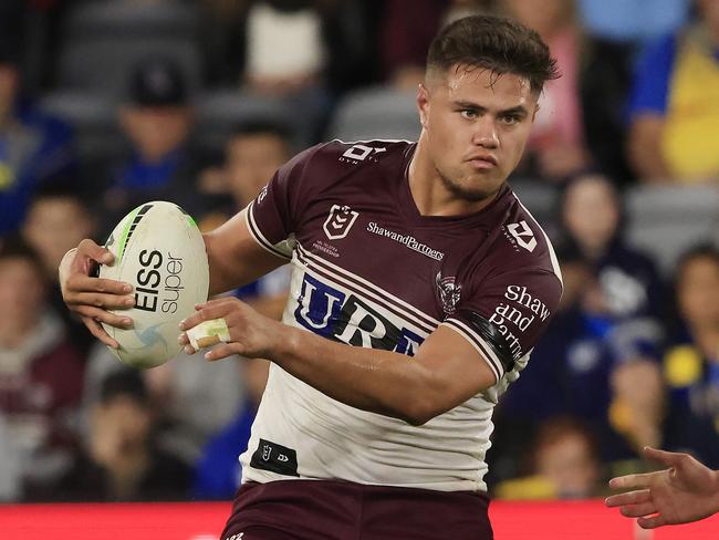 SYDNEY, AUSTRALIA - MAY 23: Josh Schuster of Manly is tackled   during the round 11 NRL match between the Parramatta Eels and the Manly Sea Eagles at Bankwest Stadium, on May 23, 2021, in Sydney, Australia. (Photo by Mark Evans/Getty Images)