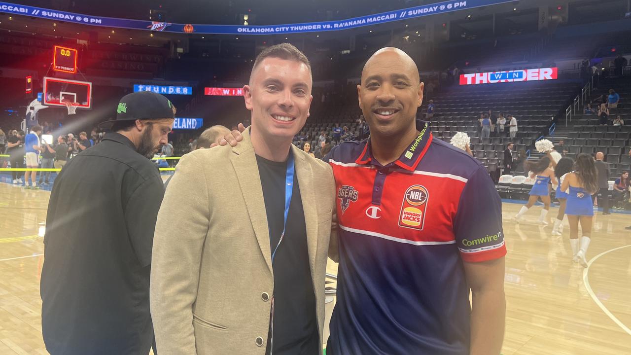 Aaron Hickmann and Adelaide 36ers coach CJ Bruton in the US.