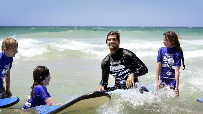 If you’re bored in your desk job, start thinking about what else you can do. Pierre Robino is a surf Instructor at Coolum Beach. Picture: Megan Slade