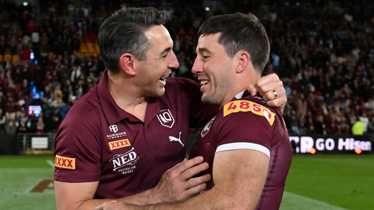 Maroons coach Billy Slater celebrates with Ben Hunt after Queensland’s win. Picture: Bradley Kanaris/Getty Images