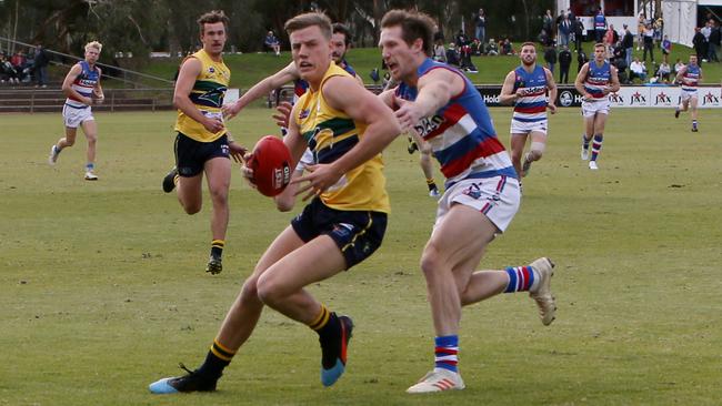 Woodville-West Torrens’ Nick Hayes gets hold of the ball during the Eagles’ win over Central District at Elizabeth Oval. Picture: AAP/Emma Brasier