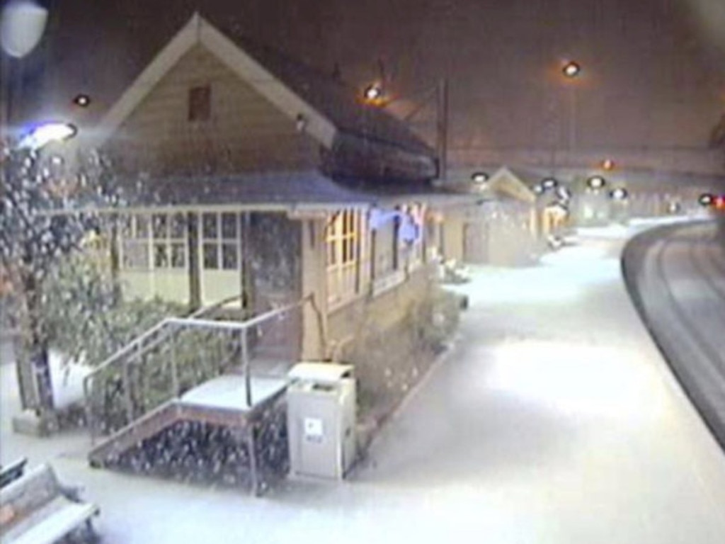 Katoomba train station blanketed in snow.