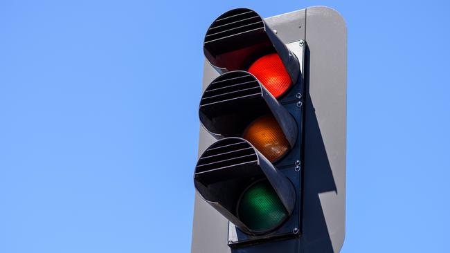 Cairns District Court heard Matt Dunlea, 30, ran a red light and struck a Year 12 student who was walking across the pedestrian crossing when that light went green.