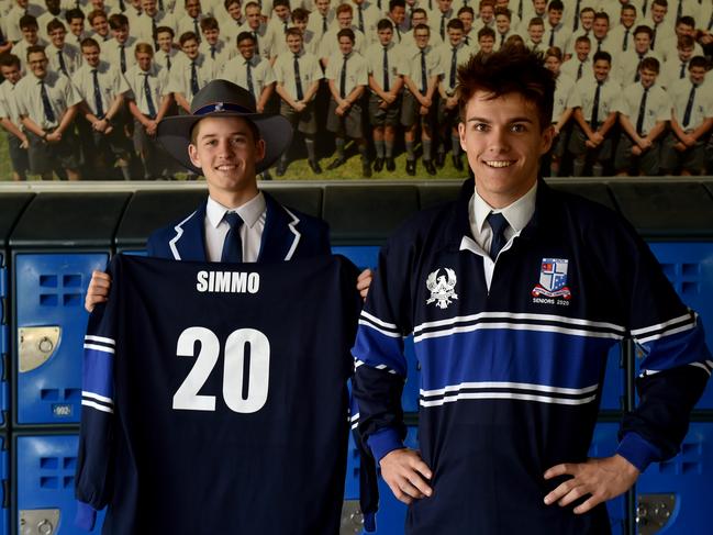 Ignatius Park College year 12 students Kai Simmons and Harry Keir, both 17, with their levers jerseys. Picture: Evan Morgan