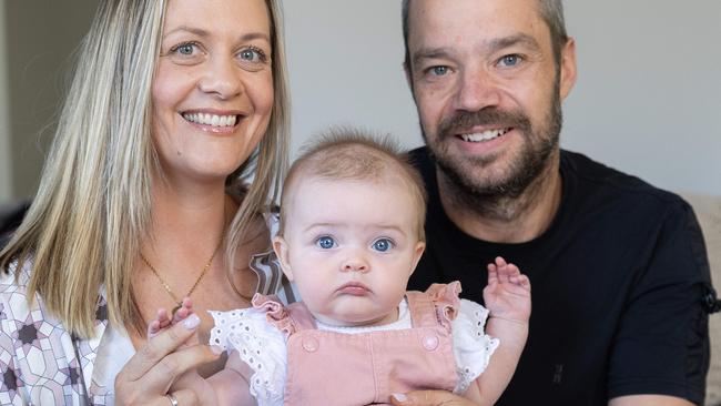 Carly De Mamiel and Steven Hosking with Harlow, 5 months. The couple found out they had to do IVF and now have a baby girl. The couple at their home in Carrum. Picture: Jason Edwards