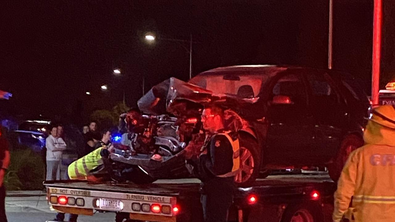 Emergency services remove the mangled car. Picture: supplied.
