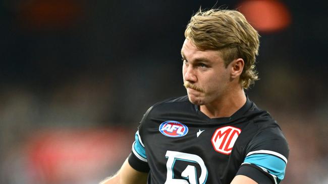 MELBOURNE, AUSTRALIA - MARCH 15: Jason Horne-Francis of the Power warms up during the round one AFL match between Collingwood Magpies and Port Adelaide Power at Melbourne Cricket Ground, on March 15, 2025, in Melbourne, Australia. (Photo by Quinn Rooney/Getty Images)