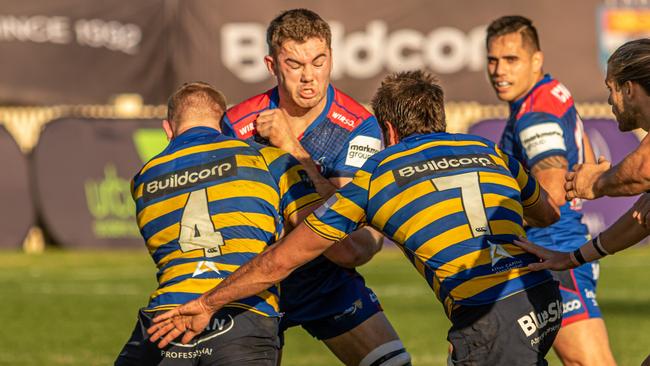 Manly lock Max Douglas getting plenty of attention from his Sydney University rivals. Pic: Adam MacDonald